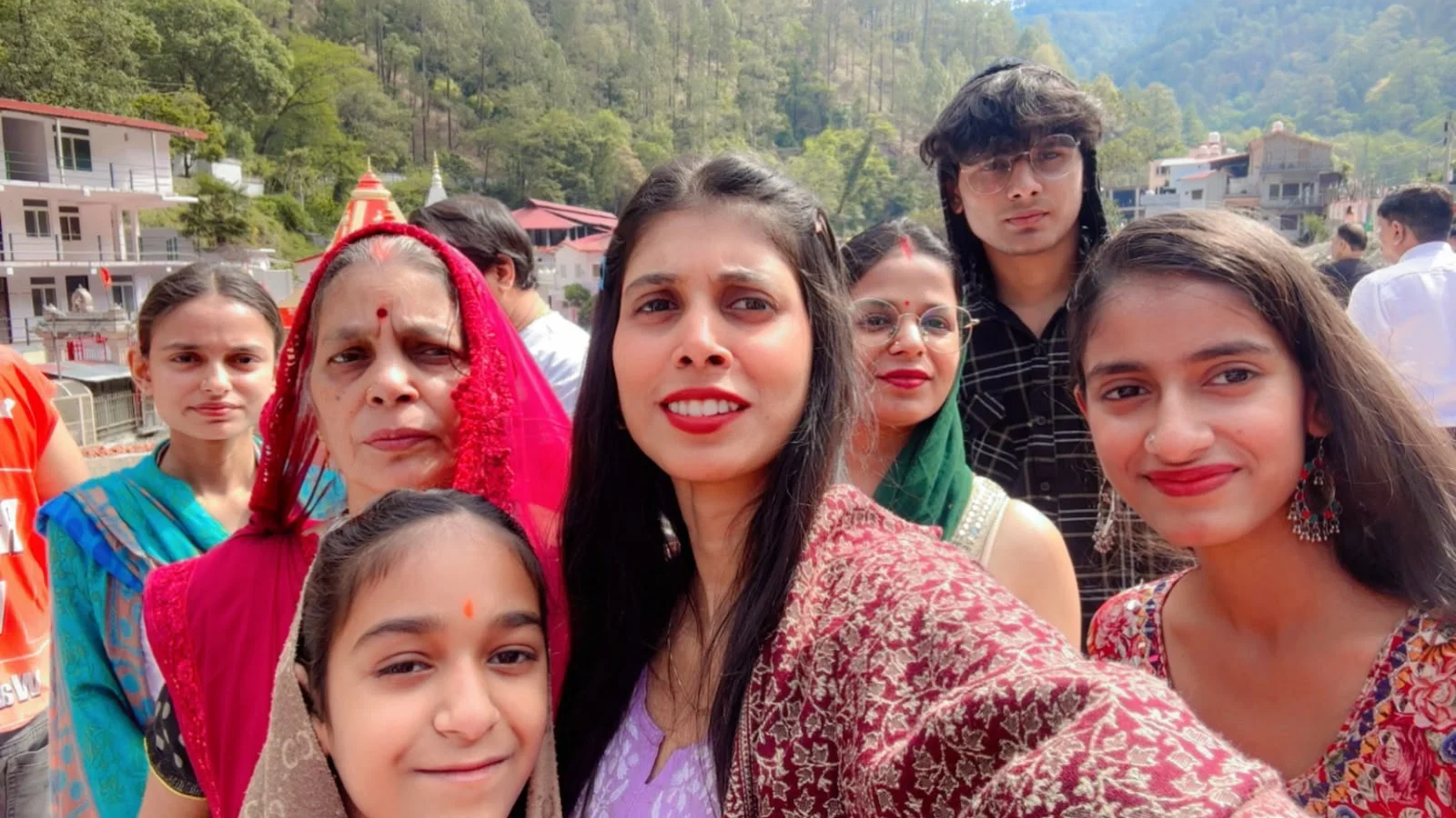 Third Eye guests smiling at Kainchi Dham temple in Uttarakhand